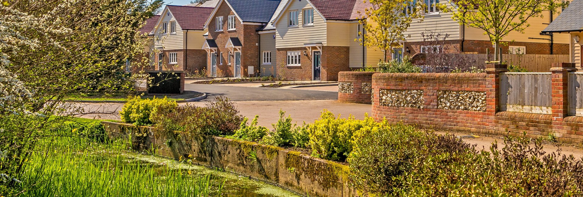 Street scene plus pond